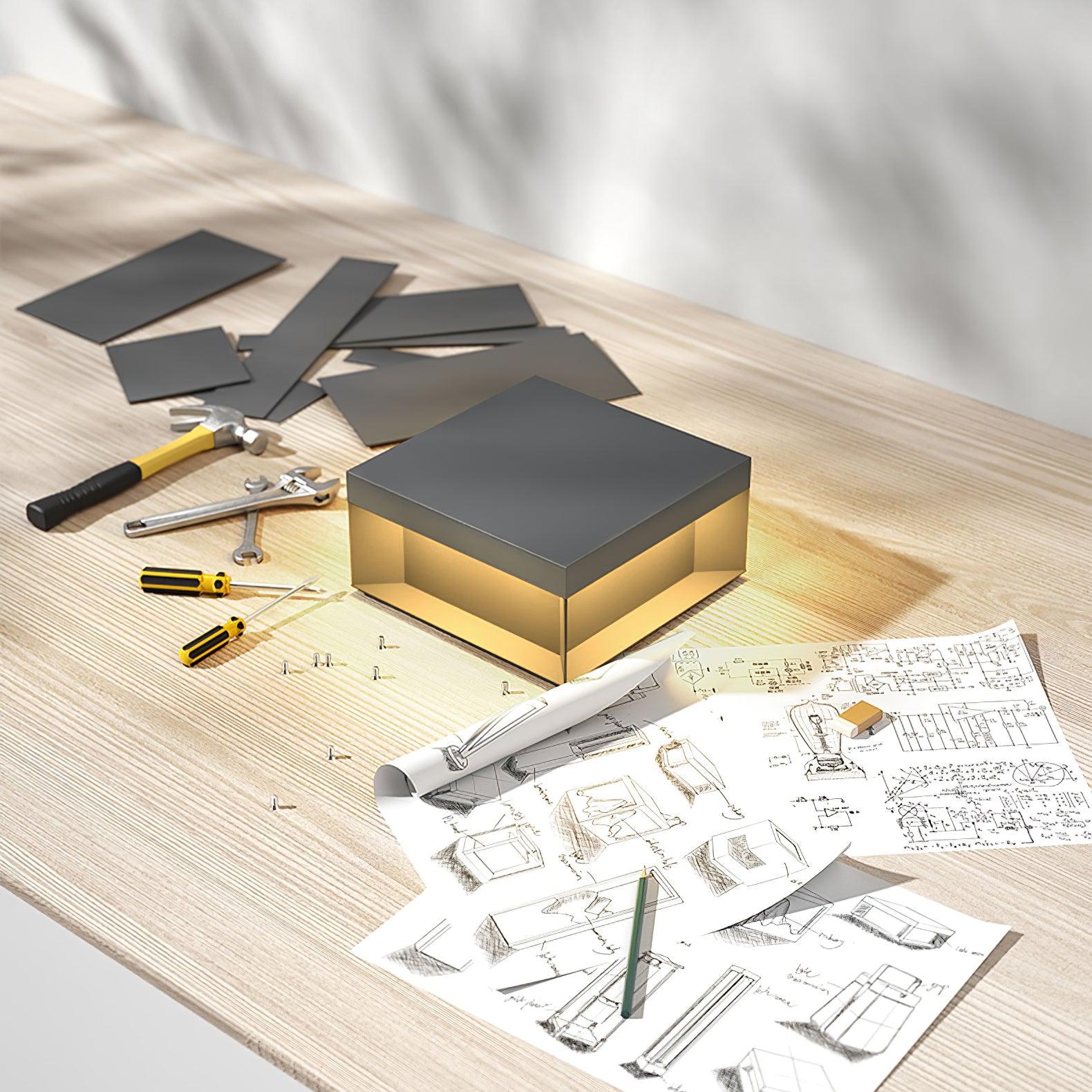 Zewnętrzna lampa solarna LED w formie czarnego prostopadłościanu