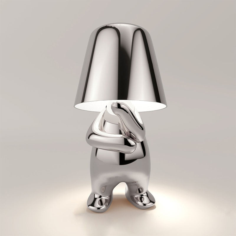 Designerska lampa stołowa LED w kształcie postaci