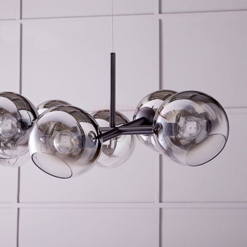 Nowoczesny żyrandol wiszący z kulistymi kloszami